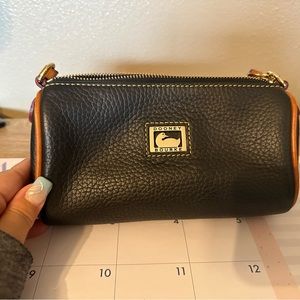 Dooney and Bourke pebbled, leather, mini purse, and like new condition